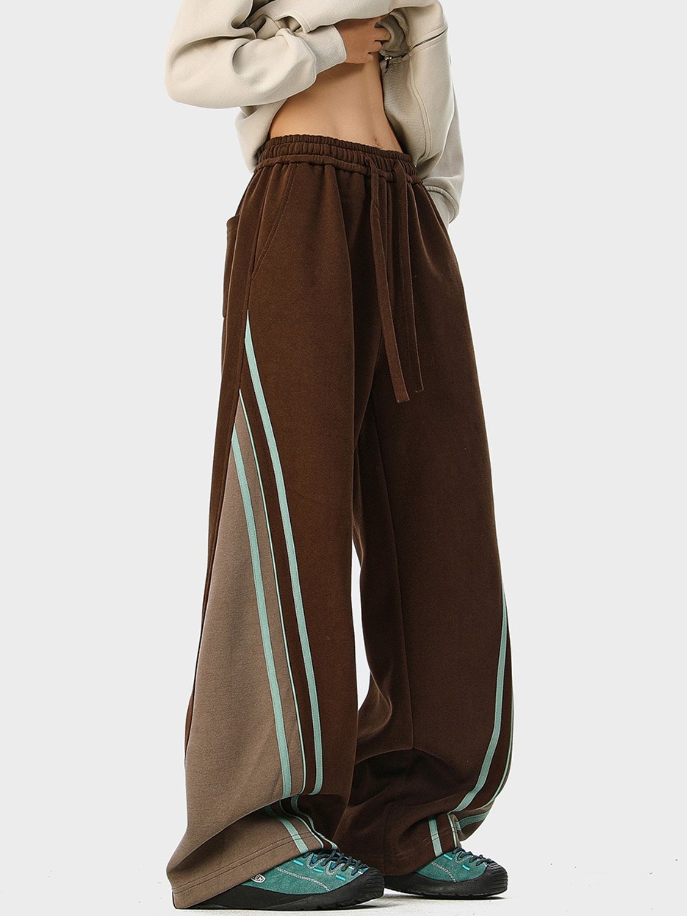 Vintage-Style Women'S Loose-Fitting Straight-Leg Sweatpants Featuring an Elastic Waistband with Contrasting Stripes, Available in Various Colors. These Jogging Pants Are Made from Slightly Stretchy Fabric, Perfect for Casual Outings, Gym Sessions