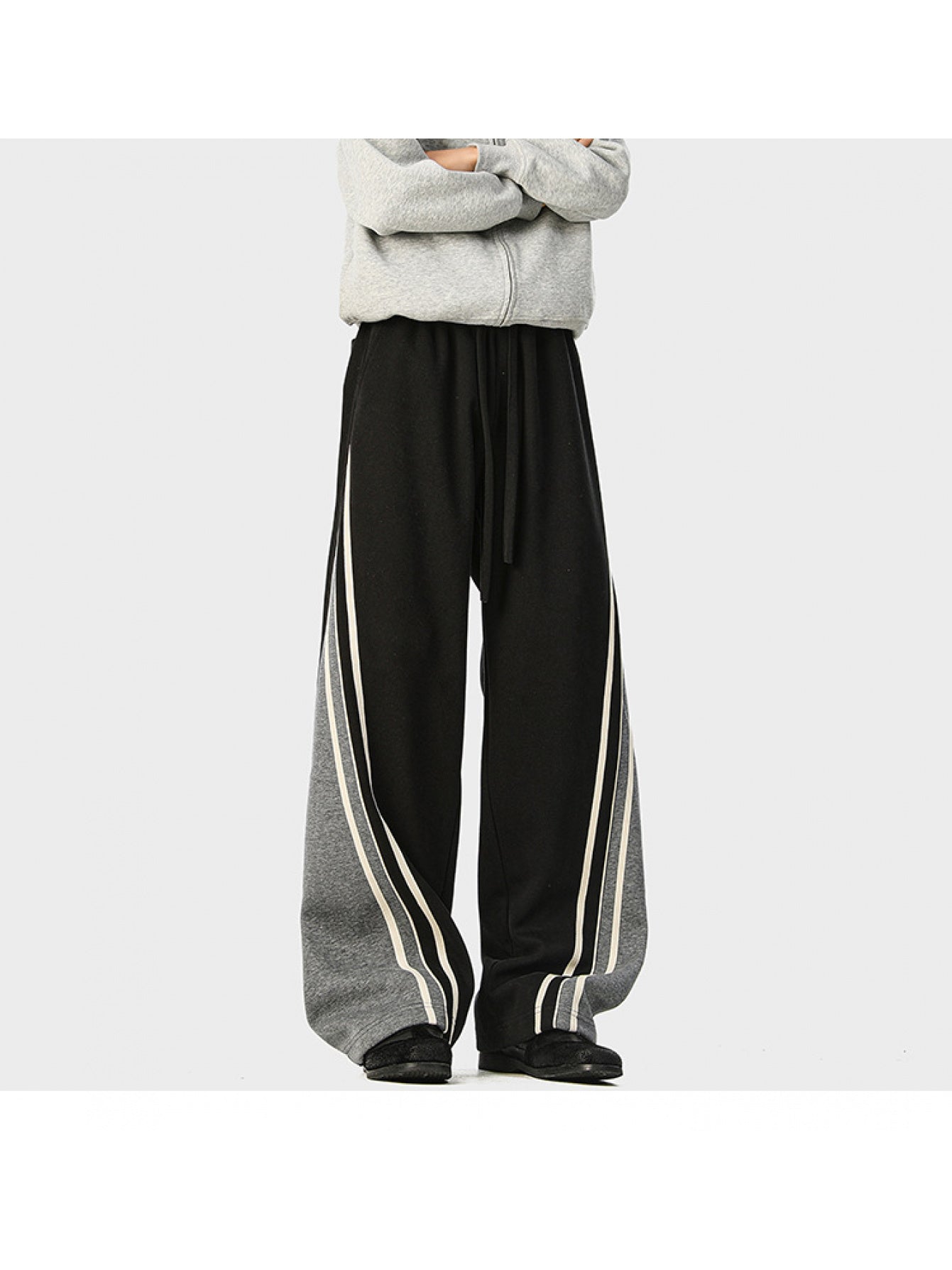Vintage-Style Women'S Loose-Fitting Straight-Leg Sweatpants Featuring an Elastic Waistband with Contrasting Stripes, Available in Various Colors. These Jogging Pants Are Made from Slightly Stretchy Fabric, Perfect for Casual Outings, Gym Sessions