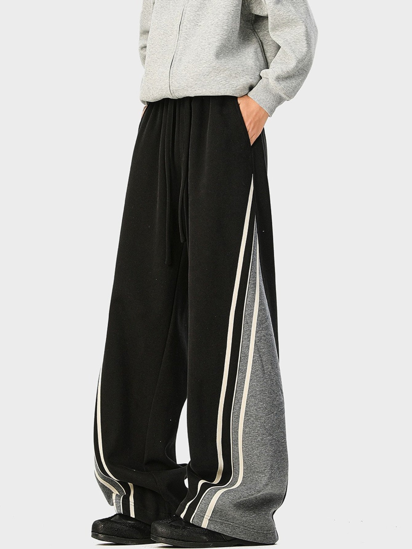 Vintage-Style Women'S Loose-Fitting Straight-Leg Sweatpants Featuring an Elastic Waistband with Contrasting Stripes, Available in Various Colors. These Jogging Pants Are Made from Slightly Stretchy Fabric, Perfect for Casual Outings, Gym Sessions